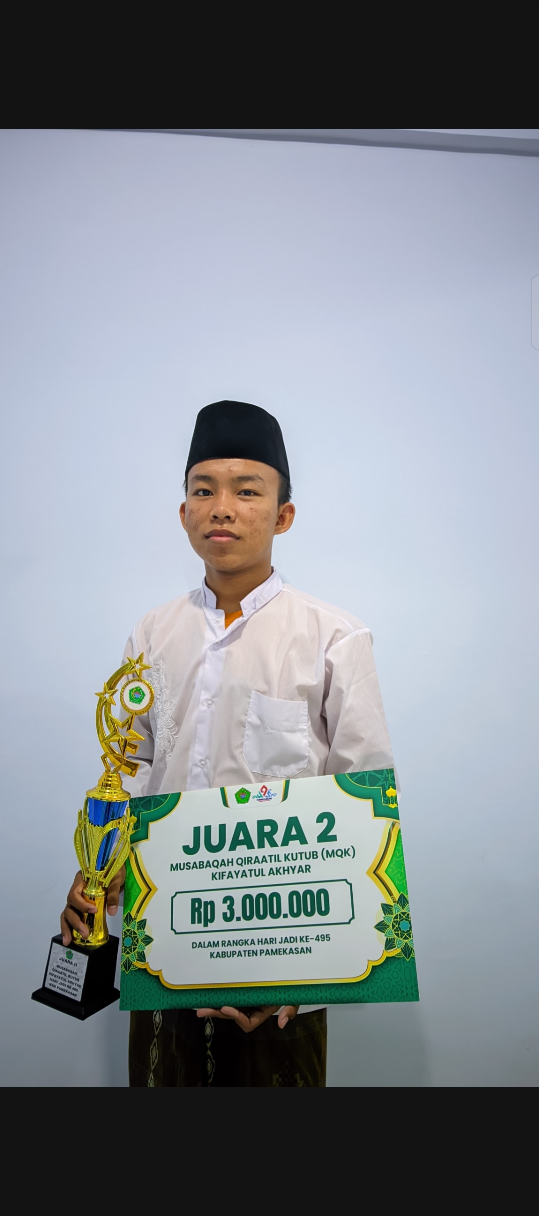 "M. Nur Hidayatullah" Juara Ke-2 Musabaqoh Qiroatil Kutub (MQK) Miftahul Akhyar Dalam rangka Hari Jadi Kabupaten Pamekasan ke-495